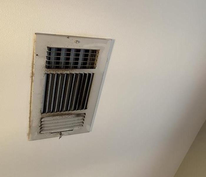 An example of a dirty AC vent that needs to be cleaned